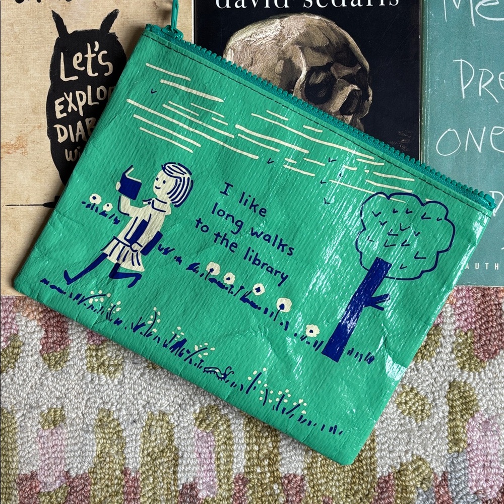 Blue Q “I like long walks to the library” NWT zip pouch Girl walks while reading